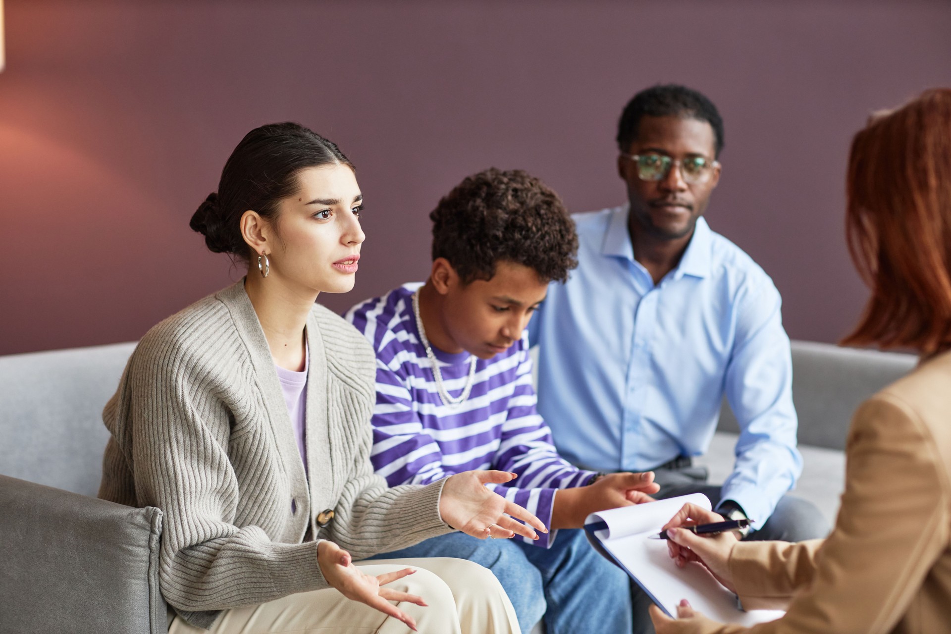 Family Discussing Problems with Psychologist